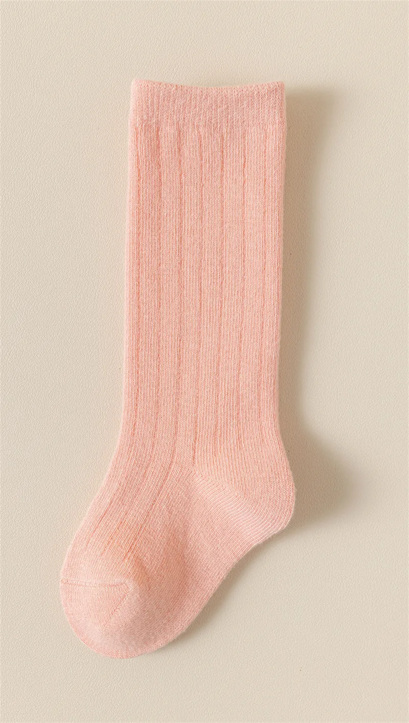 Pink basic cotton baby socks knee high style for infants and toddlers. Pink basic cotton baby socks knee high style for infants and toddlers.