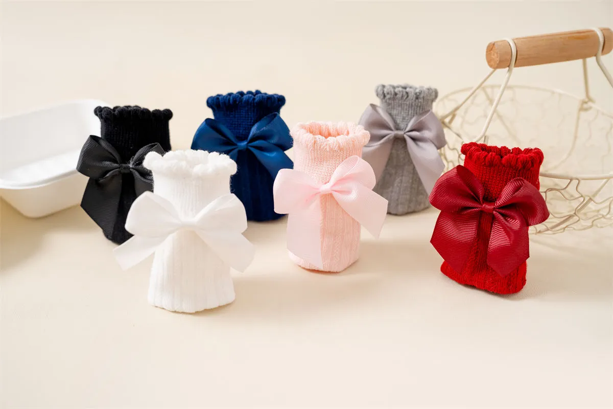Baby girls knee high bow socks multiple colors available Baby girls knee high bow socks multiple colors available