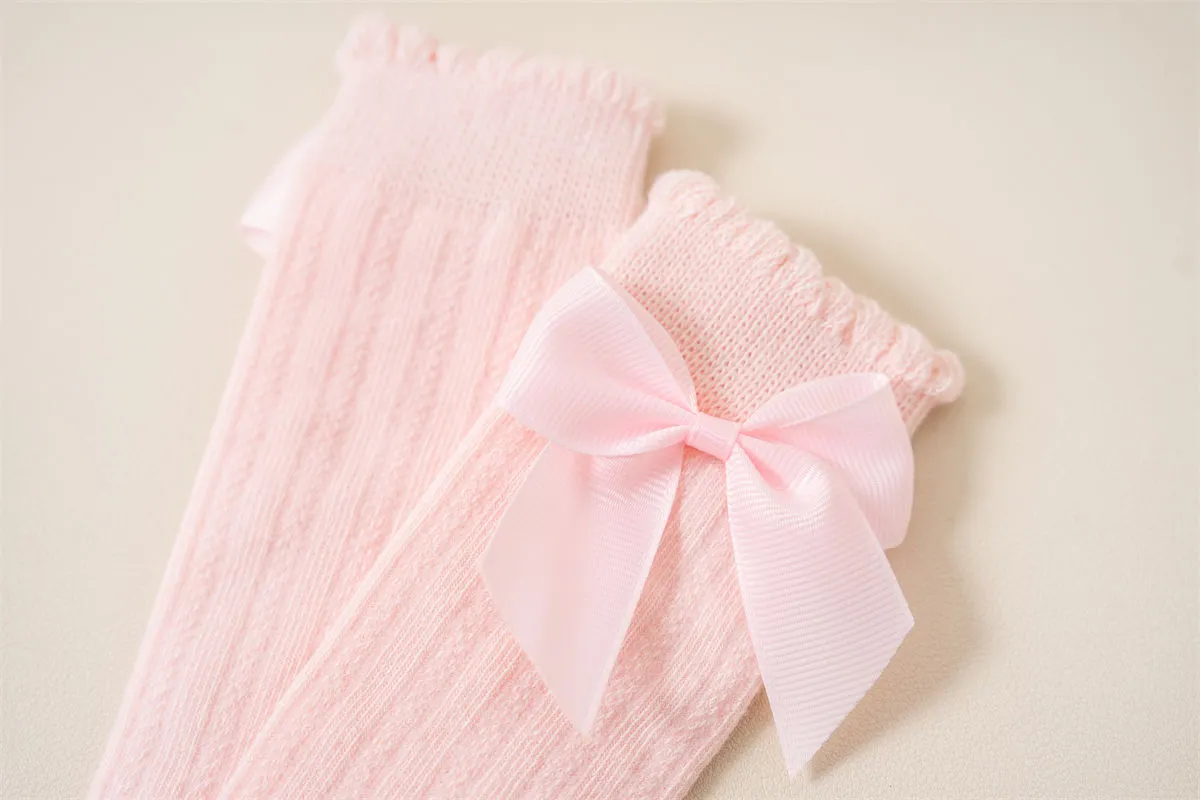 Baby socks elegant bow design detail Baby socks elegant bow design detail