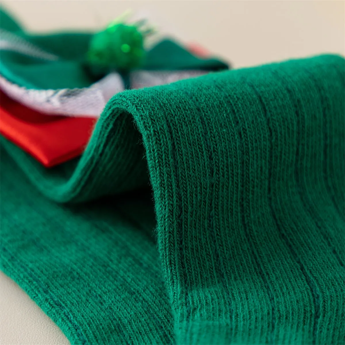 Soft knitted Christmas socks fabric detail for kids Soft knitted Christmas socks fabric detail for kids